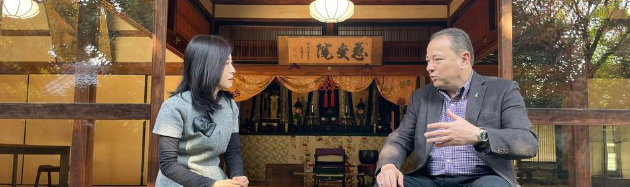 The dialogue between Mr. Corsunsky, the Ukrainian ambassador, and Madoka Mayuzumi